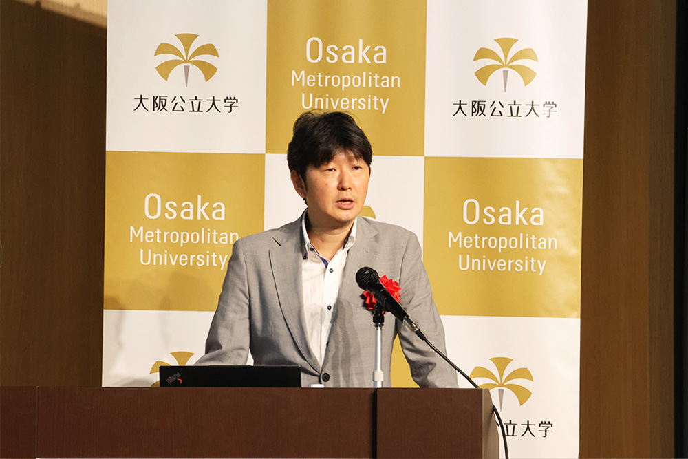 文部科学省科学技術・学術政策局 馬場 大輔参事官（研究環境担当）による基調講演